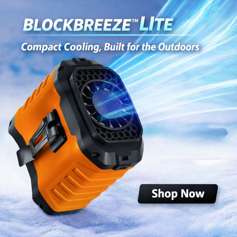 BlockBreeze Lite cooling device with orange and black design on a snowy background