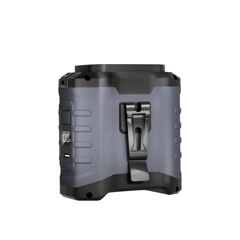 Gray and black device with a clip on a white background